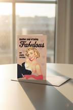 Another Year of Being Fabulous greeting card mockup with window sunlight