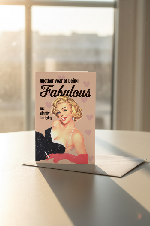 Another Year of Being Fabulous greeting card mockup with window sunlight