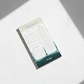 Beach Today's Focus Daily Planner Pad mockup on white background with window lighting