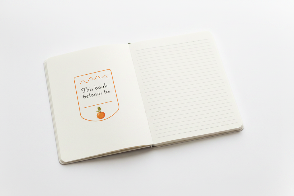 Orange Notebook inside cover with bookplate and lined pages